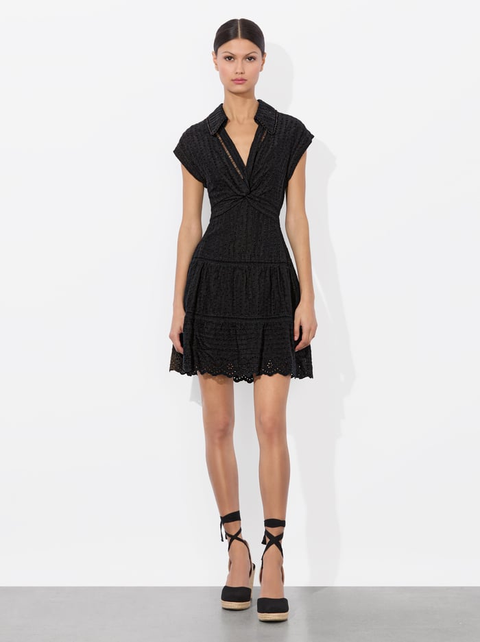 Alice + Olivia Mila Eyelet Deep V Twist Front Mini Dress in Black Alice + Olivia Mila Eyelet Deep V Twist Front Mini Dress in Black